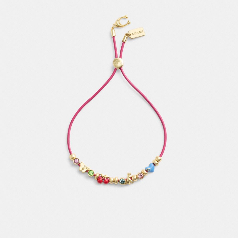 COACH®,Cherry And Heart Multi Charm Leather Slider Bracelet,Leather,Glass,Enamel,Cubic Zirconia,Crystal,Bead Embellishment...,Fuchsia,Inside View,Top View