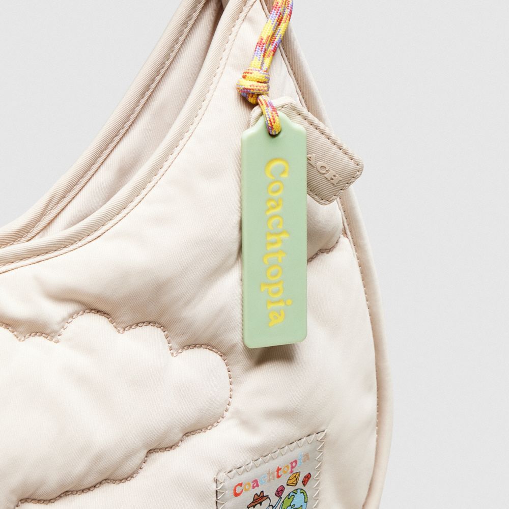 Shop Coach Topia Loop Ergo Bag With Cloud Quilting In White
