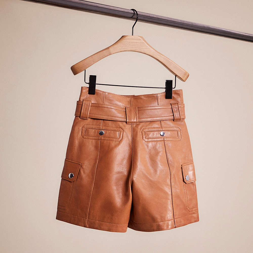 Shop Coach Restored Leather Belted Shorts In Penny