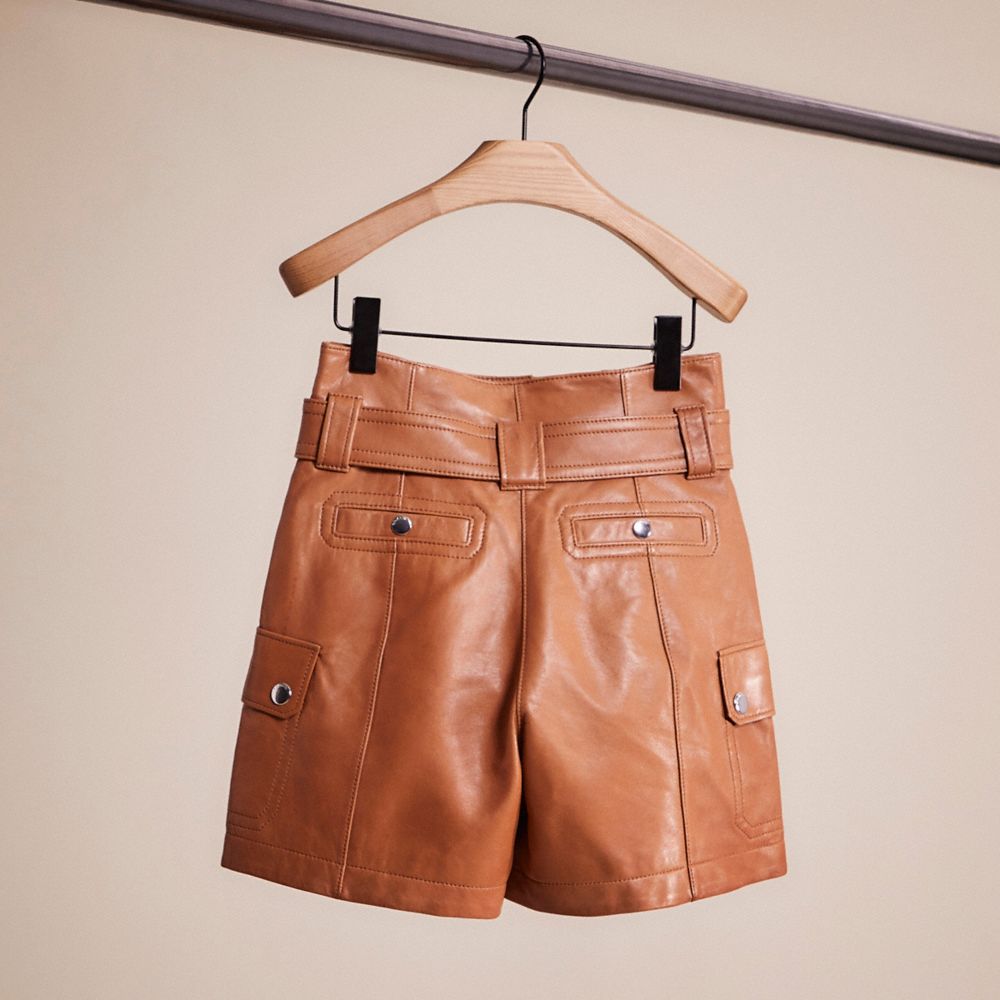 Shop Coach Restored Leather Belted Shorts In Penny