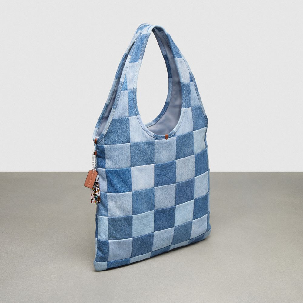COACH®,Flat Tote In Denim Checkerboard,Cotton,Lining Cotton,Tote,Plastic,Patchwork,Tag Embellishment,Logo,Casual,Blue,Angle View