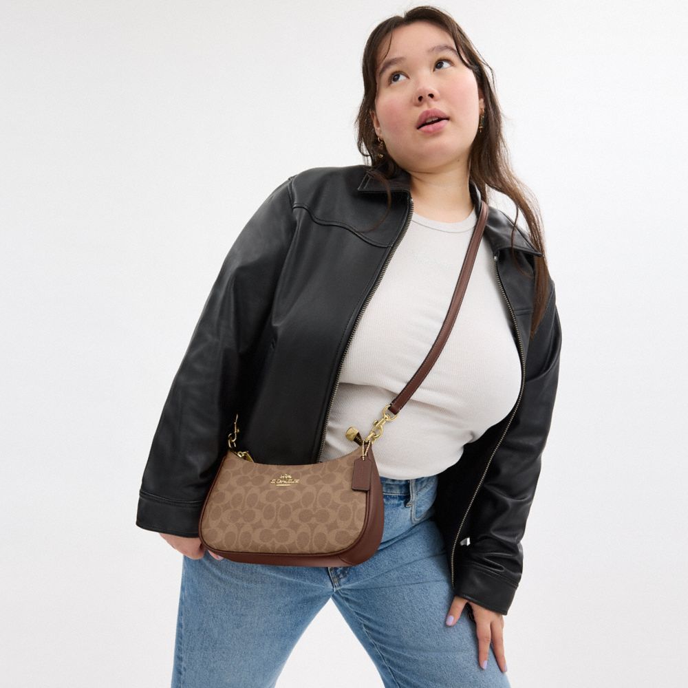 COACH®,Teri Shoulder Bag In Signature Canvas,Shoulder Bag,Metal,Embossed,Tag Embellishment,Logo,Casual,Brown,Detail View