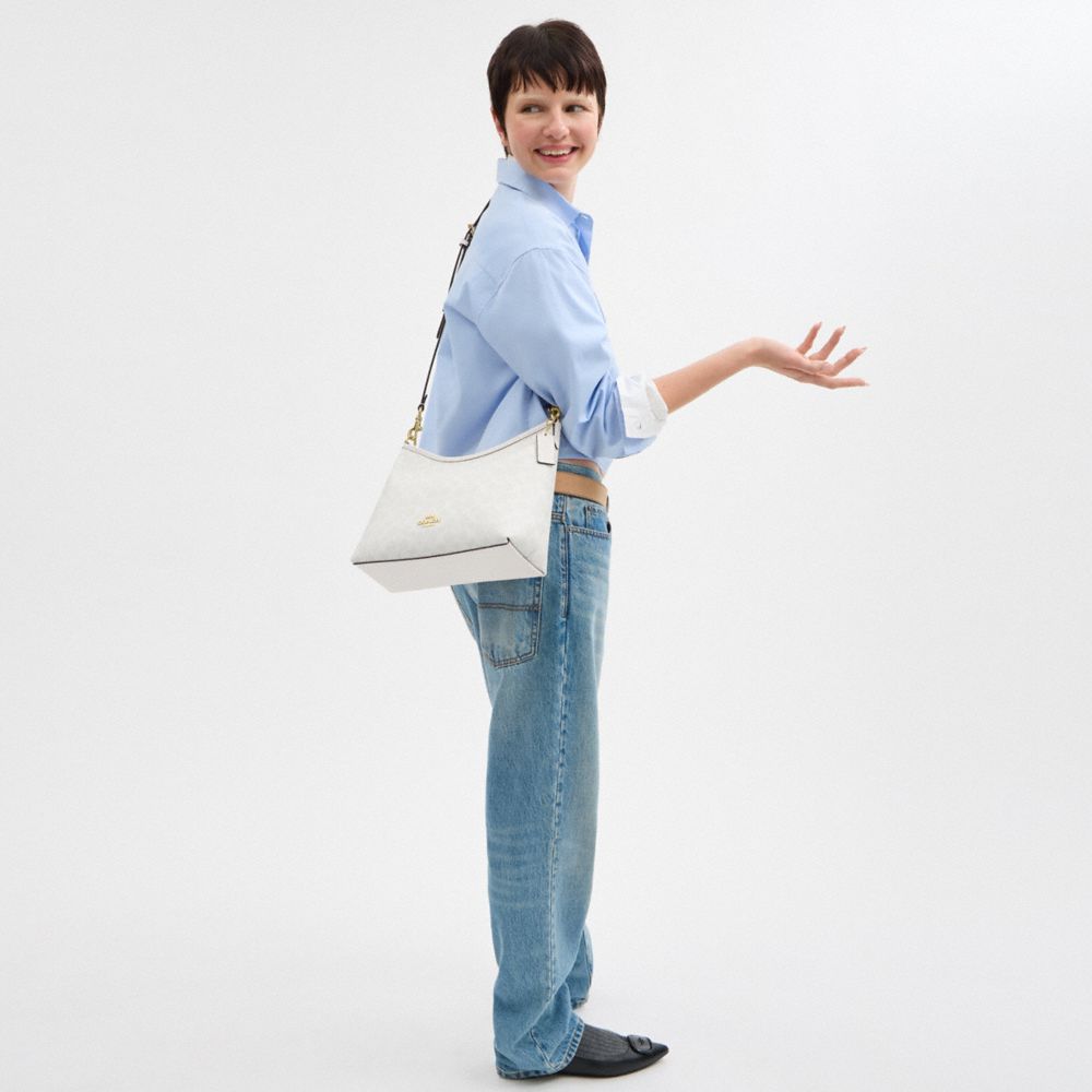 COACH®,Laurel Shoulder Bag In Signature Canvas,Canvas,Shoulder Bag,Logo,Metal,Tag Embellishment,Casual,White,Detail View