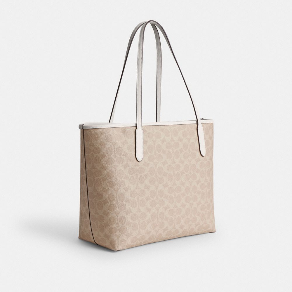 COACH®,City Tote Bag In Signature Canvas,Tote,Color Block,Embossed,Metal,Tag Embellishment,Piping,Logo,Casual,Beige,Angle View