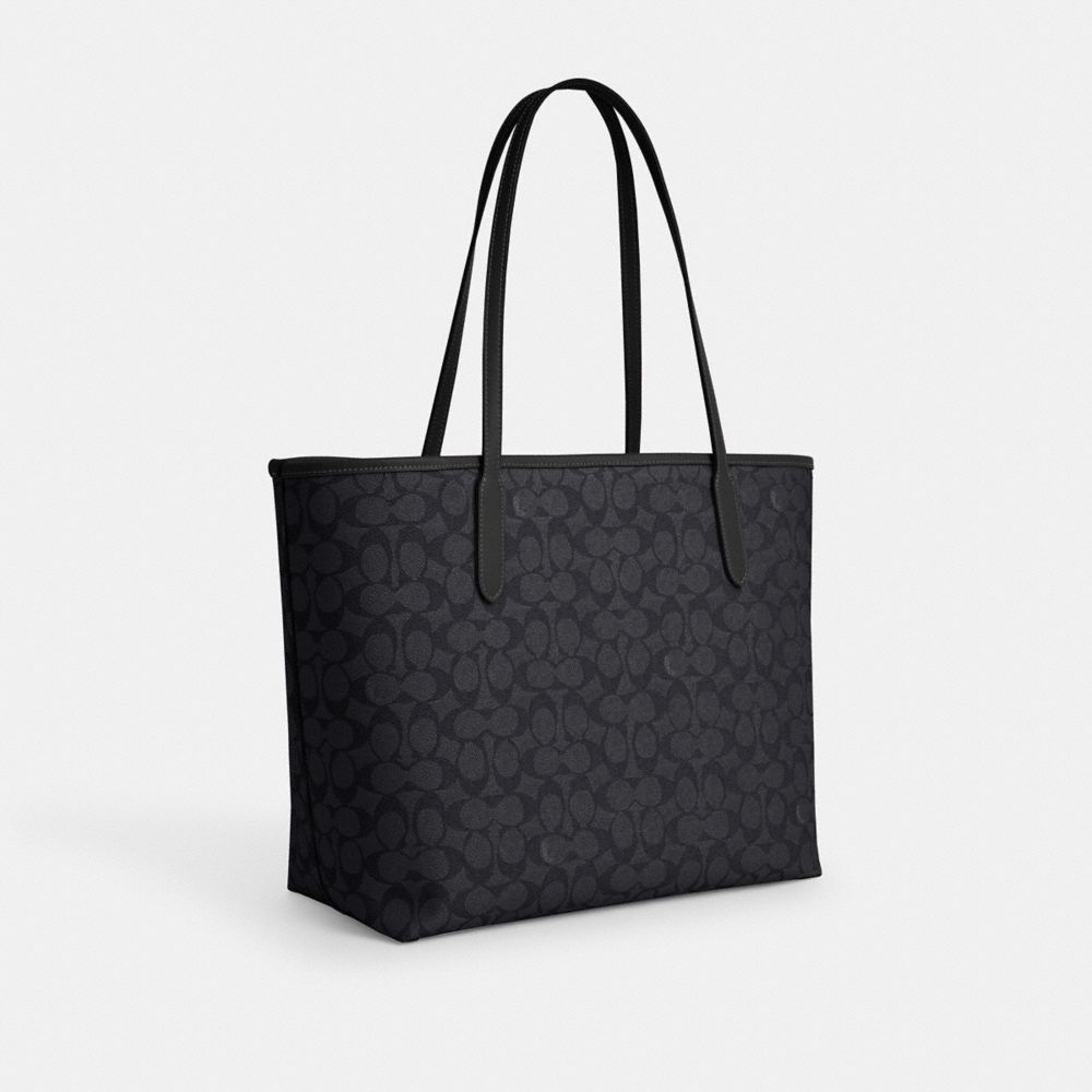 COACH®,City Tote Bag In Signature Canvas,Tote,Color Block,Embossed,Metal,Tag Embellishment,Piping,Logo,Casual,Black,Angle View