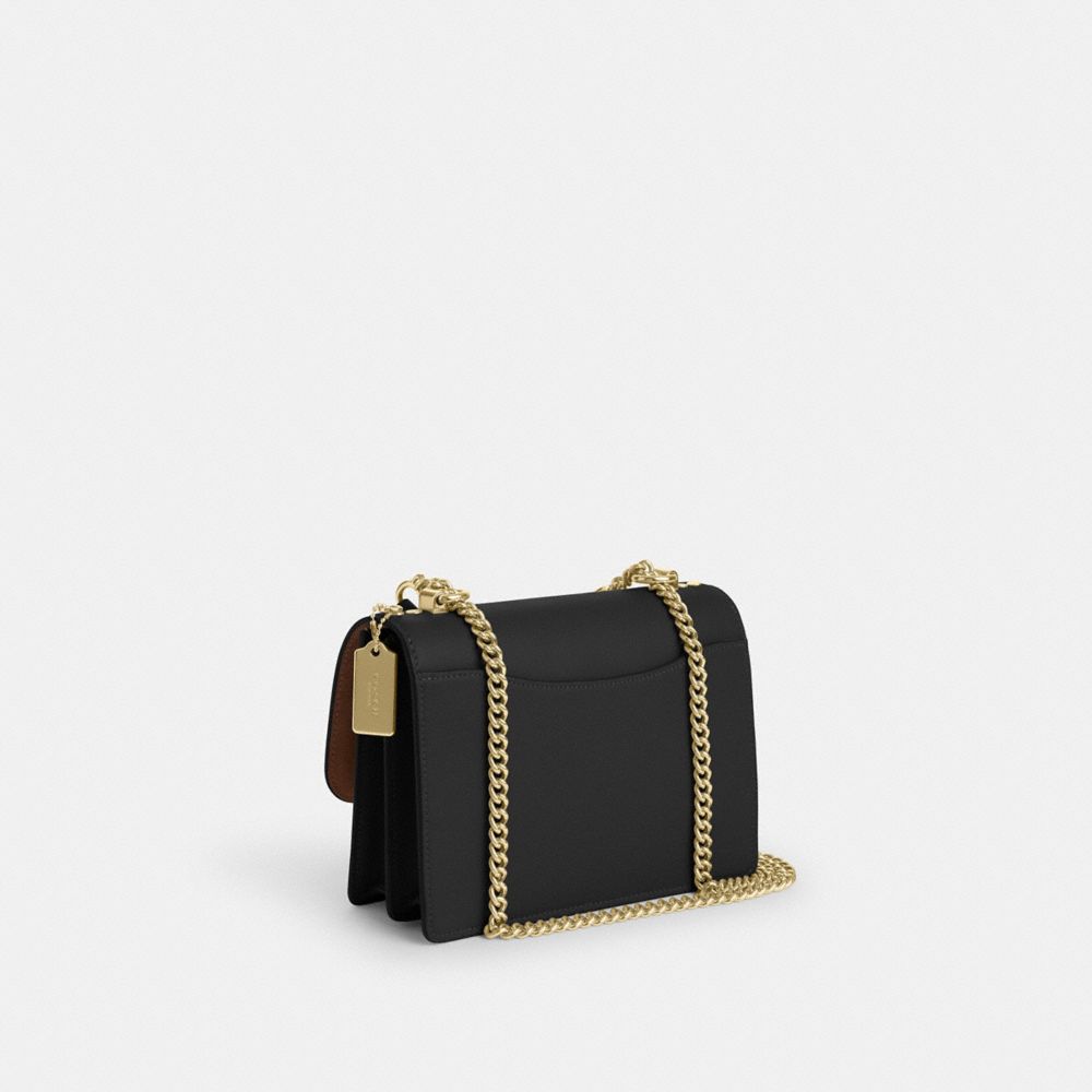 COACH®,SAC À BANDOULIÈRE KLARE EN TOILE EXCLUSIVE,Toile exclusive,Or/Marron orangé/Noir Multi,Angle View