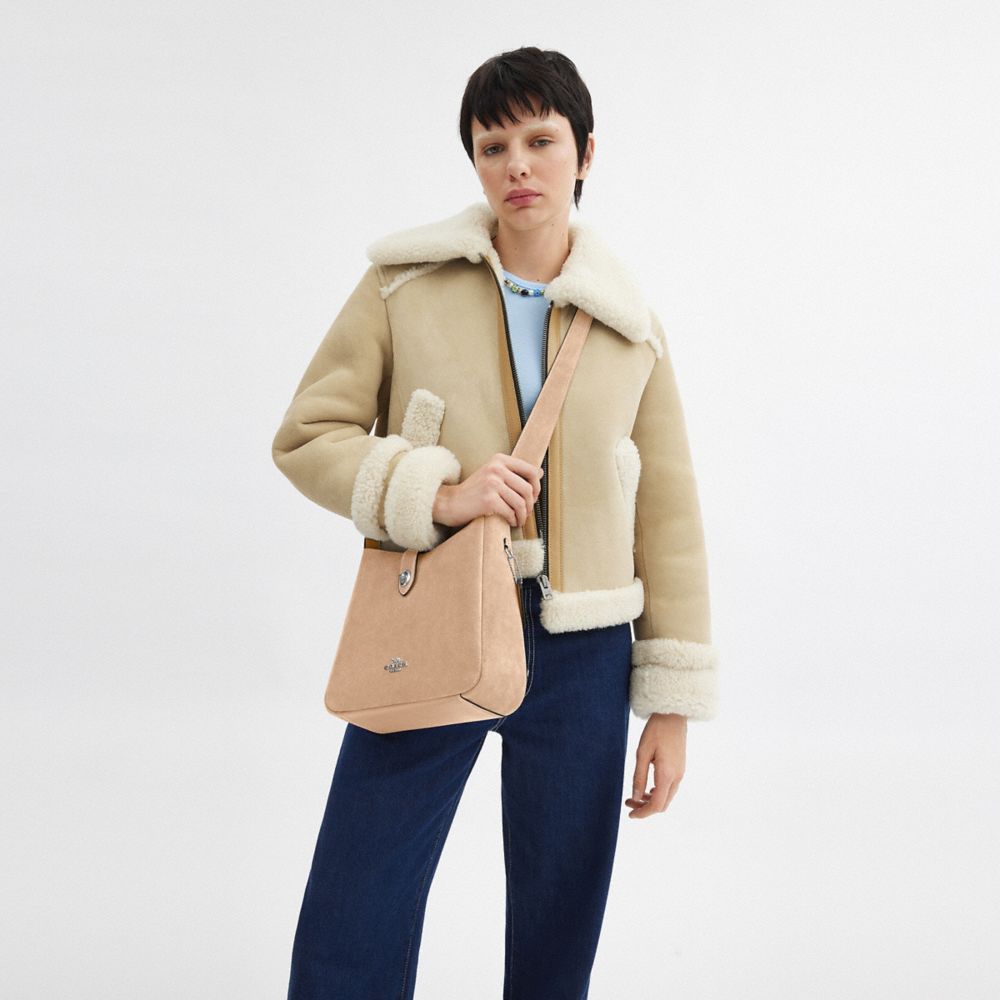 COACH®,Hadley Convertible Crossbody Bag In Suede,Suede,Crossbody,Logo,Metal,Embossed,Casual,Beige,Detail View