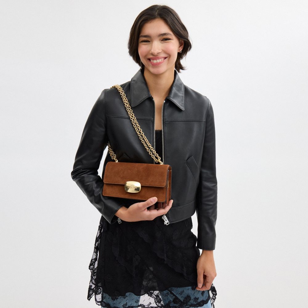 COACH®,Eliza Flap Crossbody Bag In Suede,Suede,Crossbody,Logo,Embossed,Lined,Pen Holder,Gold Metal,Casual,Day Party,Brown,Detail View