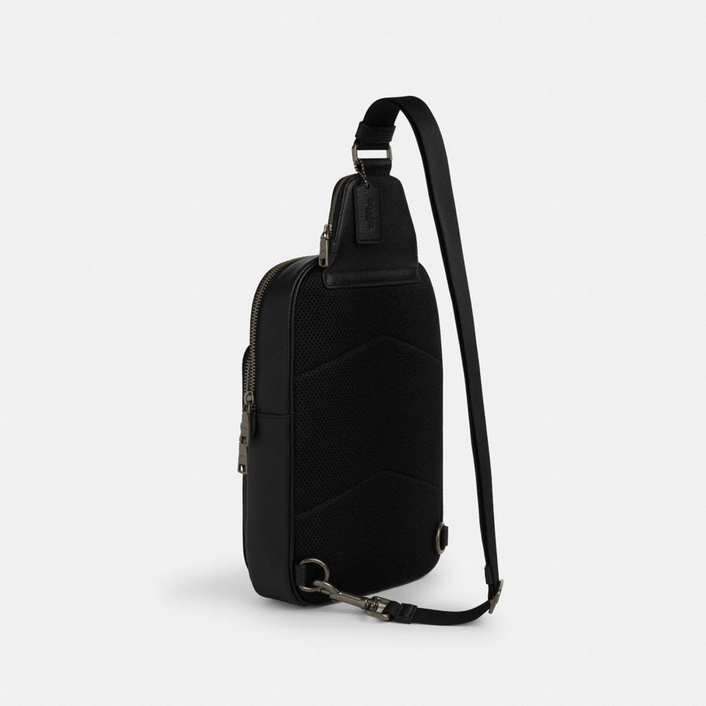 COACH®,Ethan Pack In Blocked Signature Canvas,Canvas,Leather,Slingback,Logo,Metal,Color Block,Adjustable,Casual,Multi Color,Angle View
