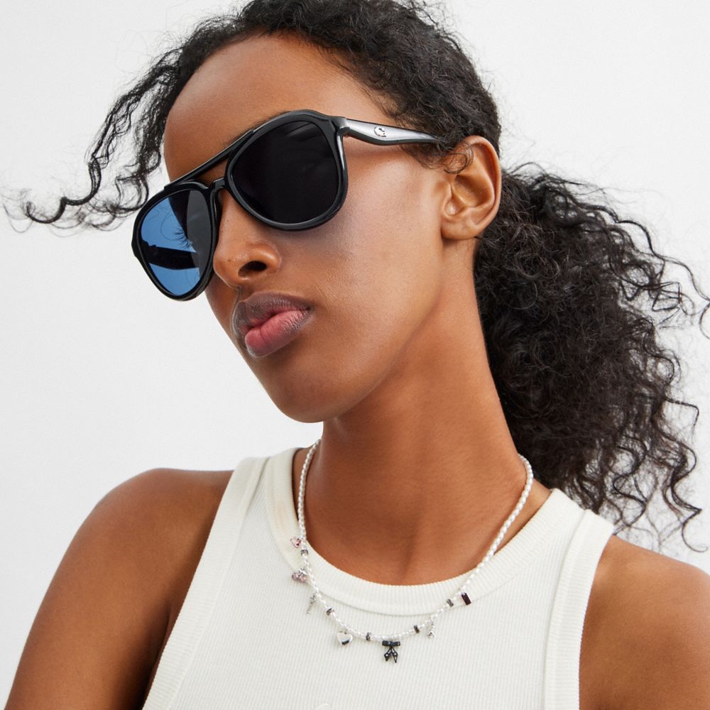 COACH®,C Hardware Pilot Sunglasses,Aviator,Word Embellishment,Metal,Logo,Integrated Nose Pads,Brow Bar,Casual,Navy,Angle View