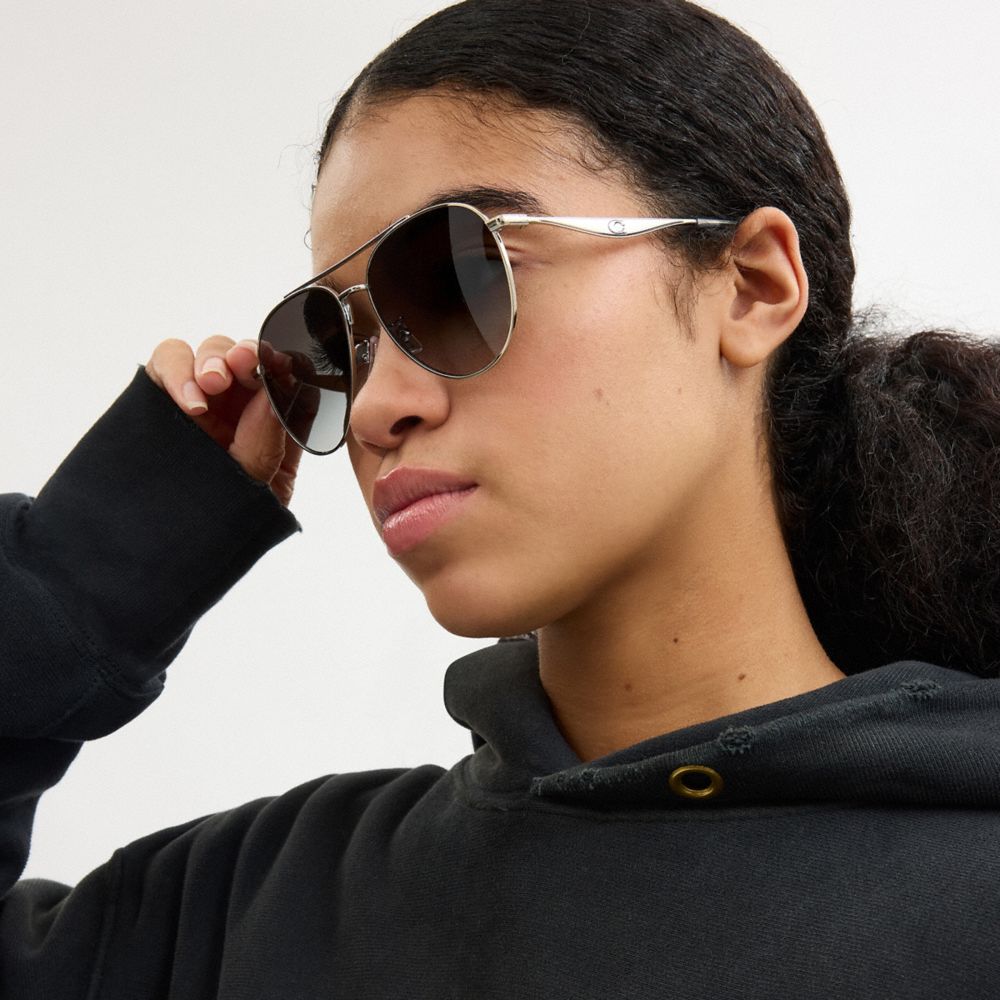 COACH®,C Hardware Metal Pilot Sunglasses,Aviator,Logo,Brow Bar,Adjustable Nose Pads,Integrated Nose Pads,Casual,Gray,Angle View