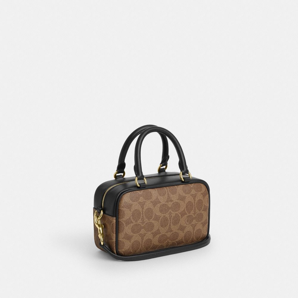 COACH®,Satchel Crossbody Bag In Signature Canvas,,Angle View