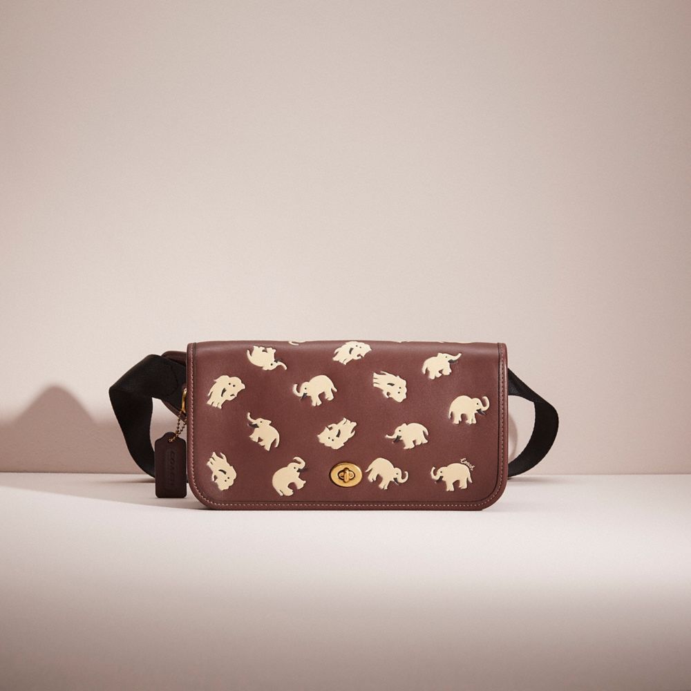 COACH®,RESTORED DINKY BELT BAG WITH ELEPHANT PRINT,Brass/Dark Teak Multi,Front View