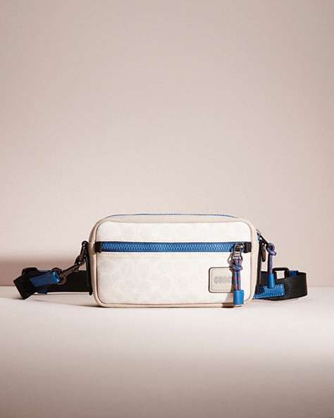 COACH®,RESTORED PACER SLIM POUCH IN SIGNATURE CANVAS,Chalk/Pacific,Front View