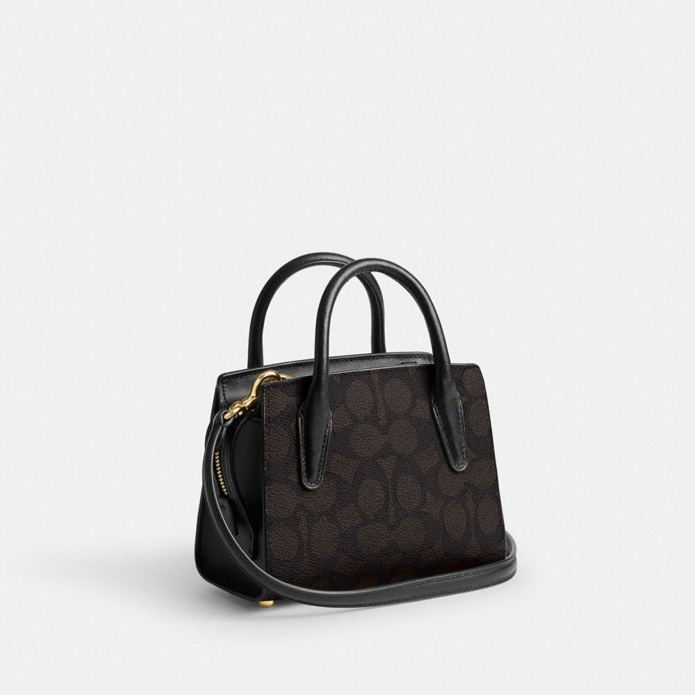 COACH®,Andrea Mini Carryall Bag In Signature Canvas,,Angle View