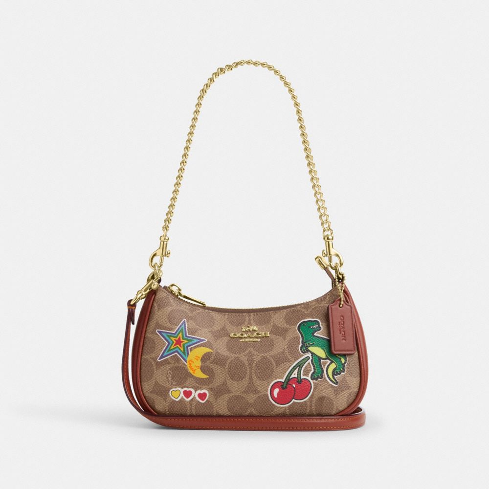 COACH®,Teri Mini Crossbody Bag In Signature Canvas With Sticker Print,Brown,Front View