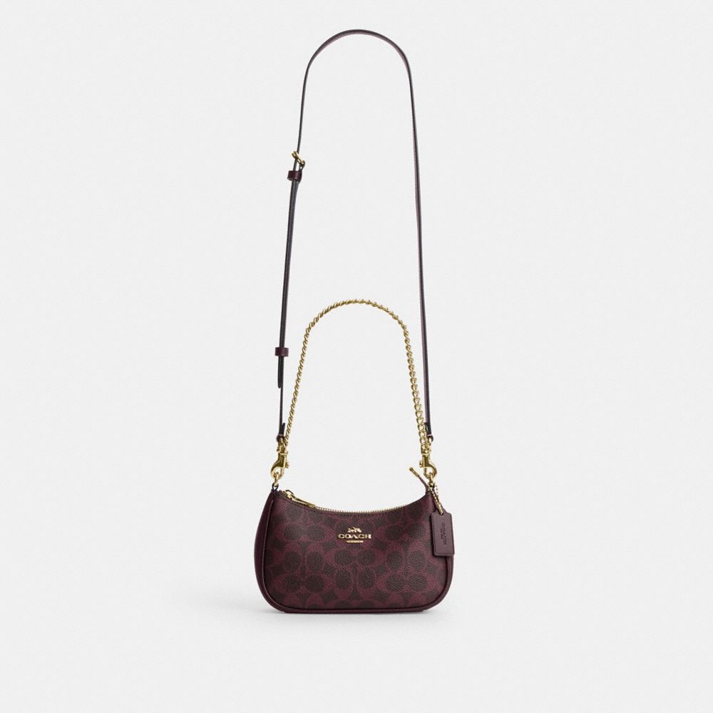 Teri Mini Crossbody Bag Signature Canvas
