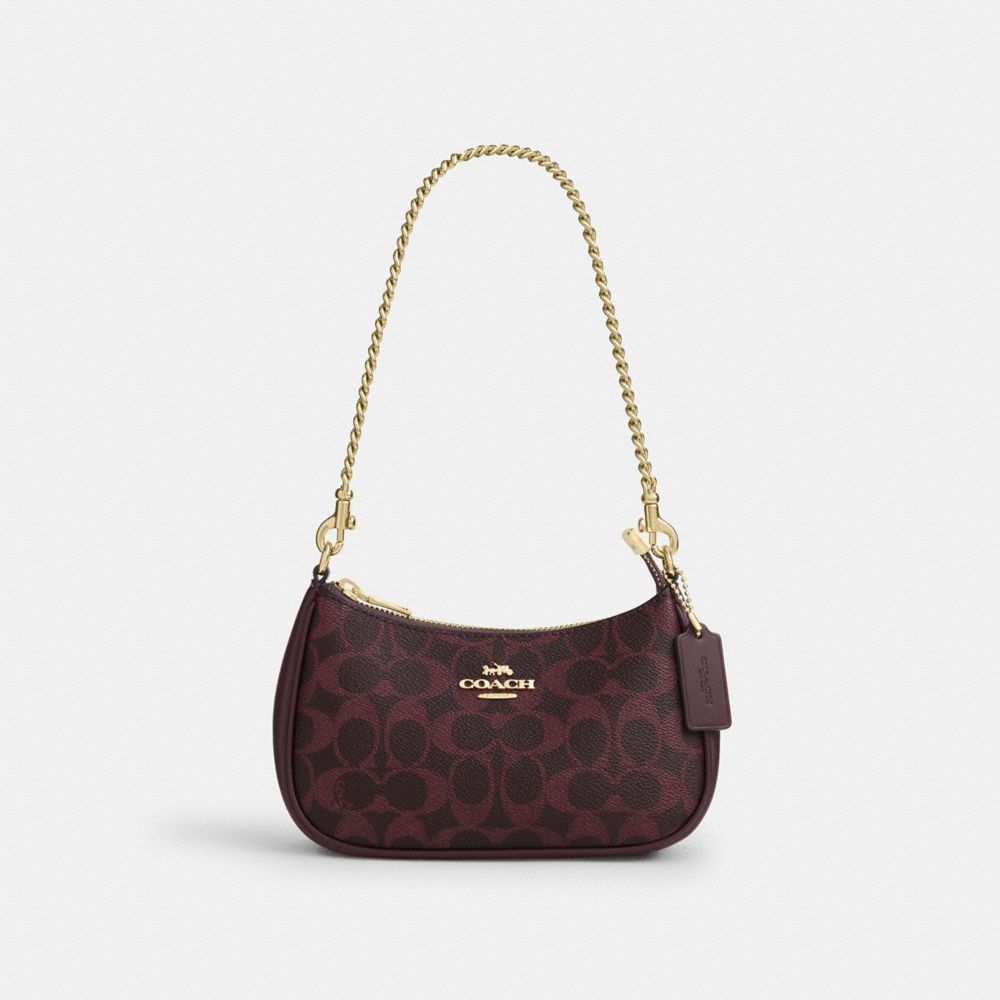 Teri Mini Crossbody Bag Signature Canvas