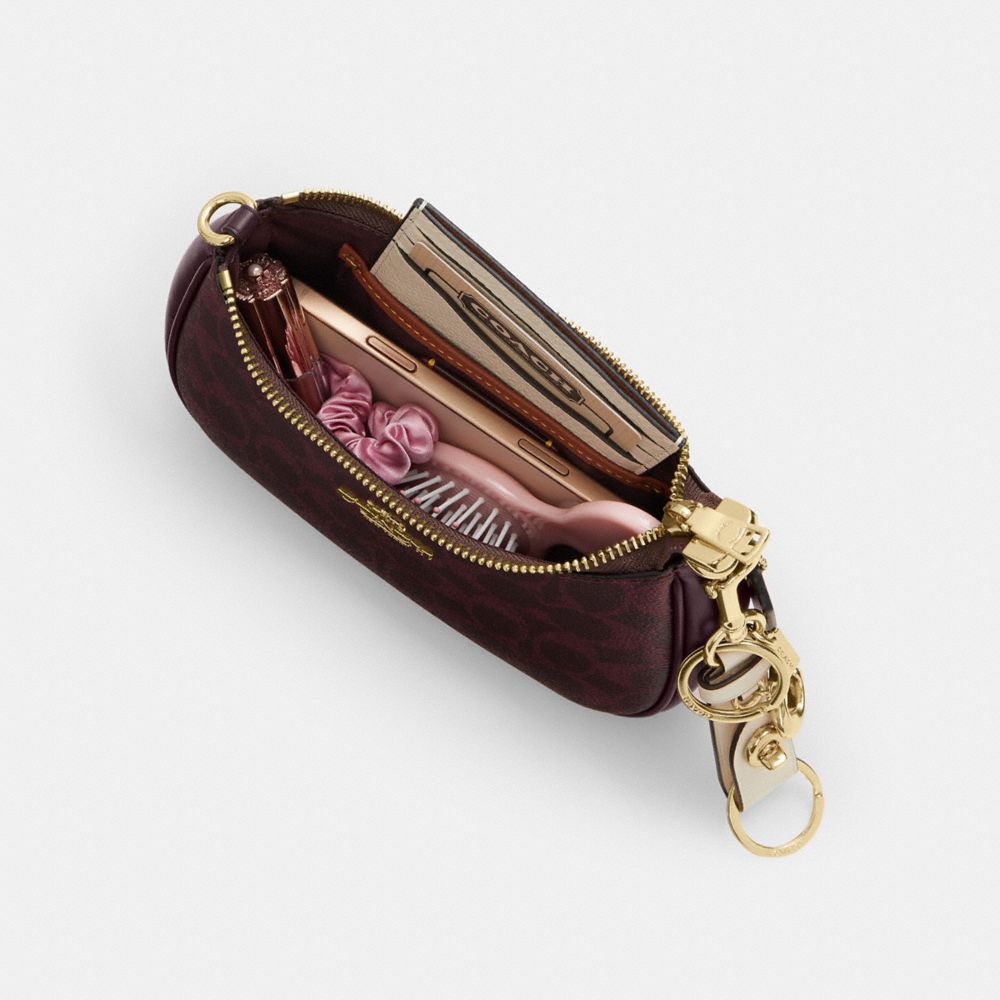 Teri Mini Crossbody Bag Signature Canvas
