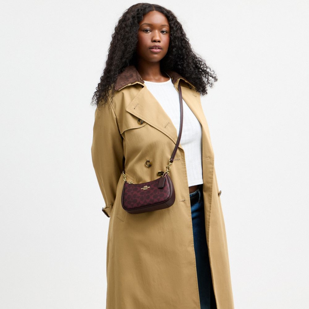 Teri Mini Crossbody Bag Signature Canvas
