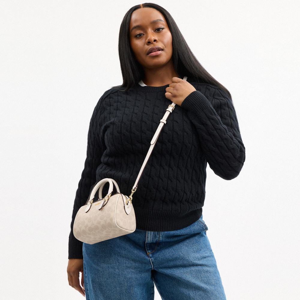 COACH®,MINI SAC BANDOULIÈRE ROWAN EN TOILE EXCLUSIVE,Toile exclusive,Or/Sable/Craie