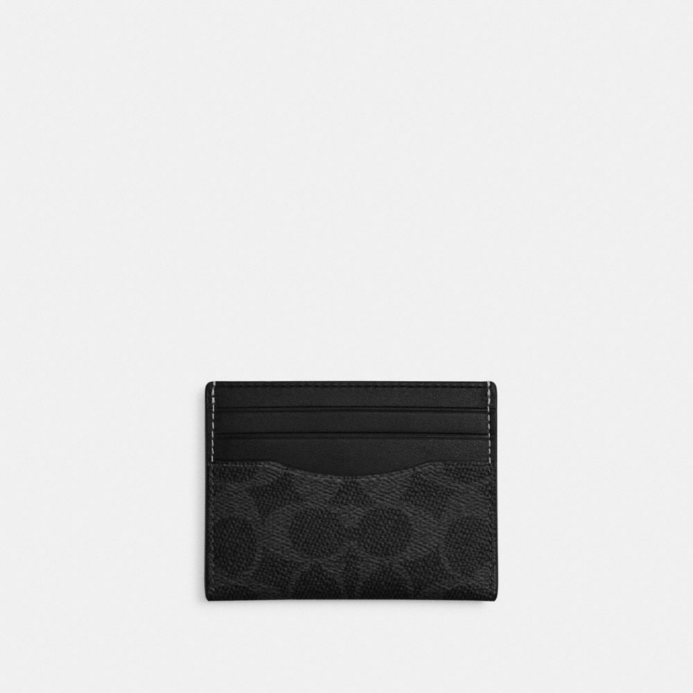 COACH®,ÉTUI-CARTES MINCE POUR PIÈCE D’IDENTITÉ EN TOILE SIGNATURE,Tissu en toile exclusif,Noir Signature,Front View