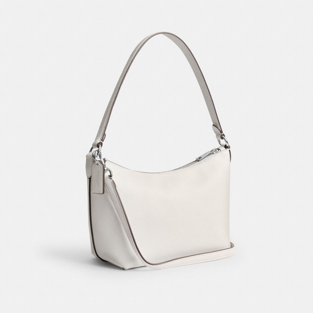 COACH®,Zip Top Shoulder Bag,White,Angle View