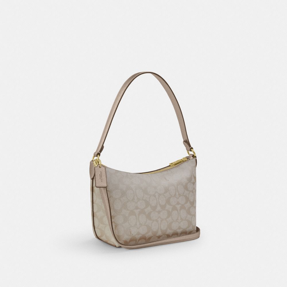 COACH®,Zip Top Shoulder Bag In Signature Canvas,,Angle View