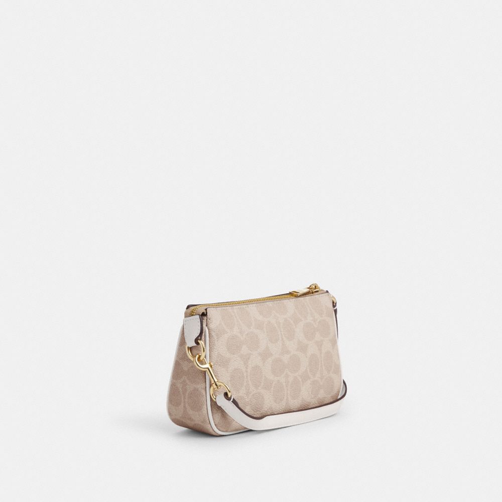 COACH®,Nolita 19 In Signature Canvas,Shoulder Bag,Tag Embellishment,Metal,Piping,Logo,Casual,Beige,Angle View