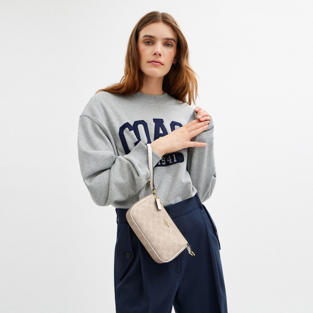 COACH®,Nolita 19 In Signature Canvas,Shoulder Bag,Tag Embellishment,Metal,Piping,Logo,Casual,Beige,Detail View