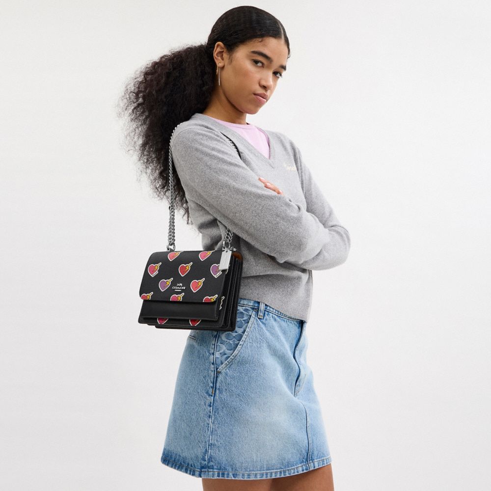 COACH®,Klare Crossbody Bag With Heart Bolt Print,Leather,Canvas,Crossbody,Logo,Metal,Adjustable,Casual,Black,Detail View