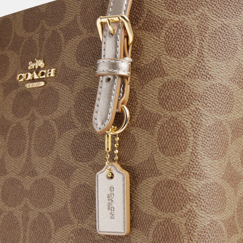 COACH®,Mollie Tote Bag 25 In Signature Canvas,Canvas,Leather,Crossbody,Metal,Logo,Adjustable,Casual,Brown,Closer View