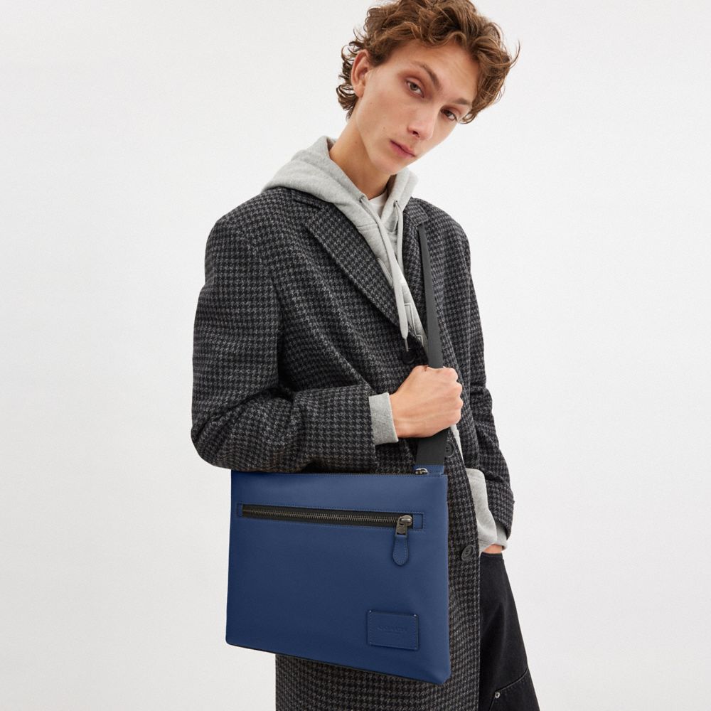 COACH®,Carrier Zip Crossbody Bag,Calfskin Leather,Crossbody,Logo,Tag Embellishment,Adjustable,Casual,Navy,Detail View