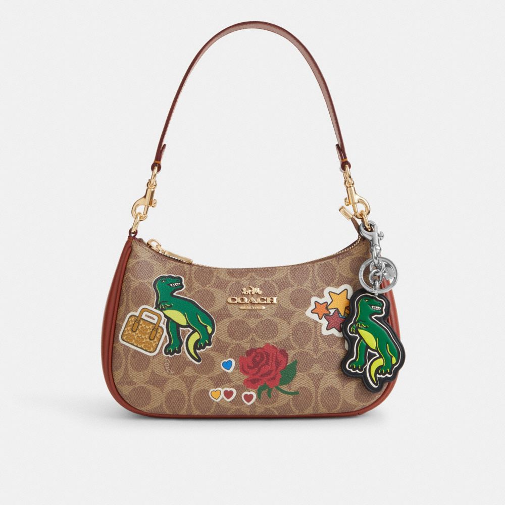 COACH®,Dinosaur Sticker Bag Charm,Multi Color,Angle View