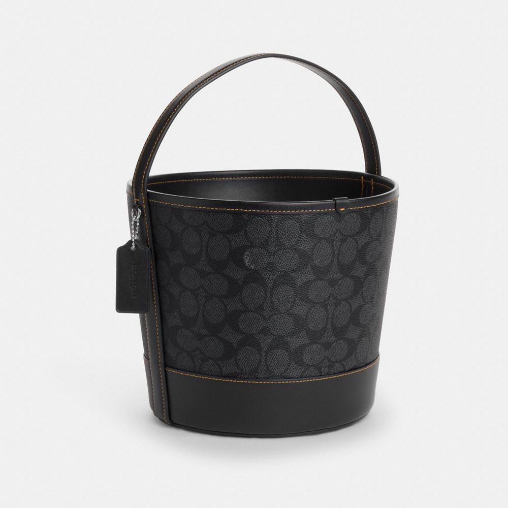 COACH®,Trick Or Treat Bucket In Signature Canvas With Halloween Graphic,Black,Angle View