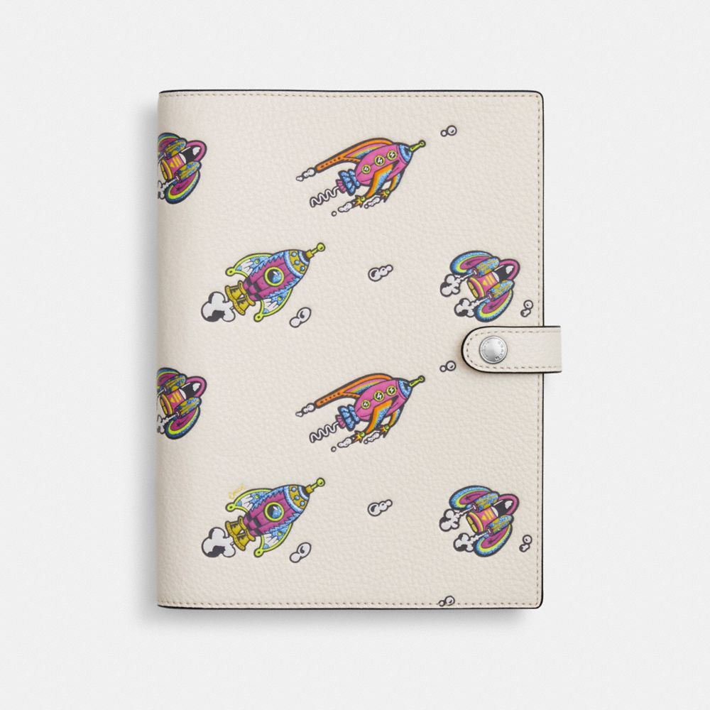 COACH®,Notebook With Rocket Print,Cream,Front View