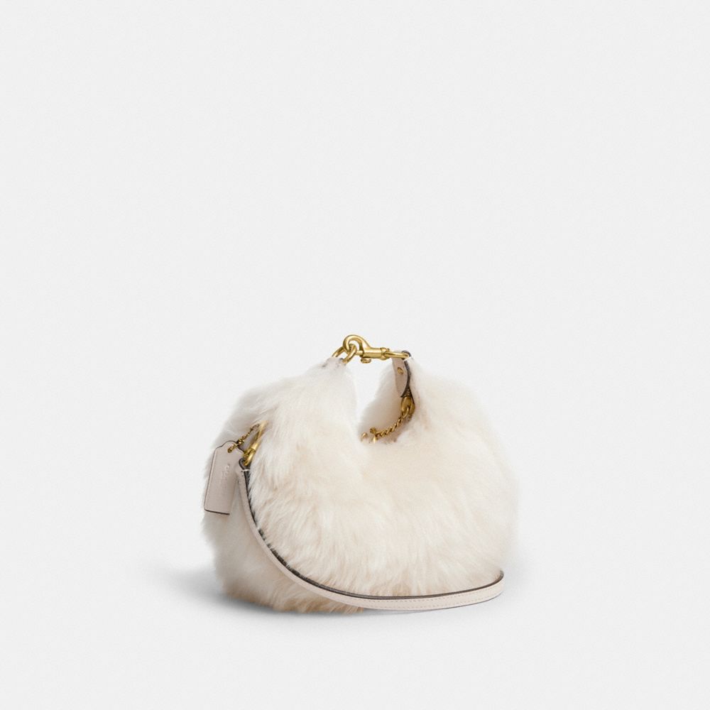 COACH®,Jonie Bag,Shearling,Crossbody,Logo,Metal,Compact,Gold Metal,Party,Day Party,White,Angle View