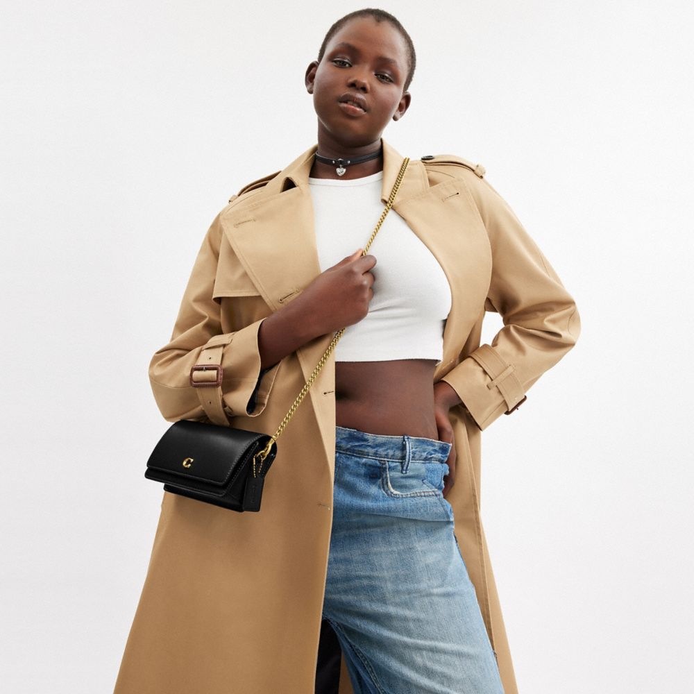 Coach In Brass/black