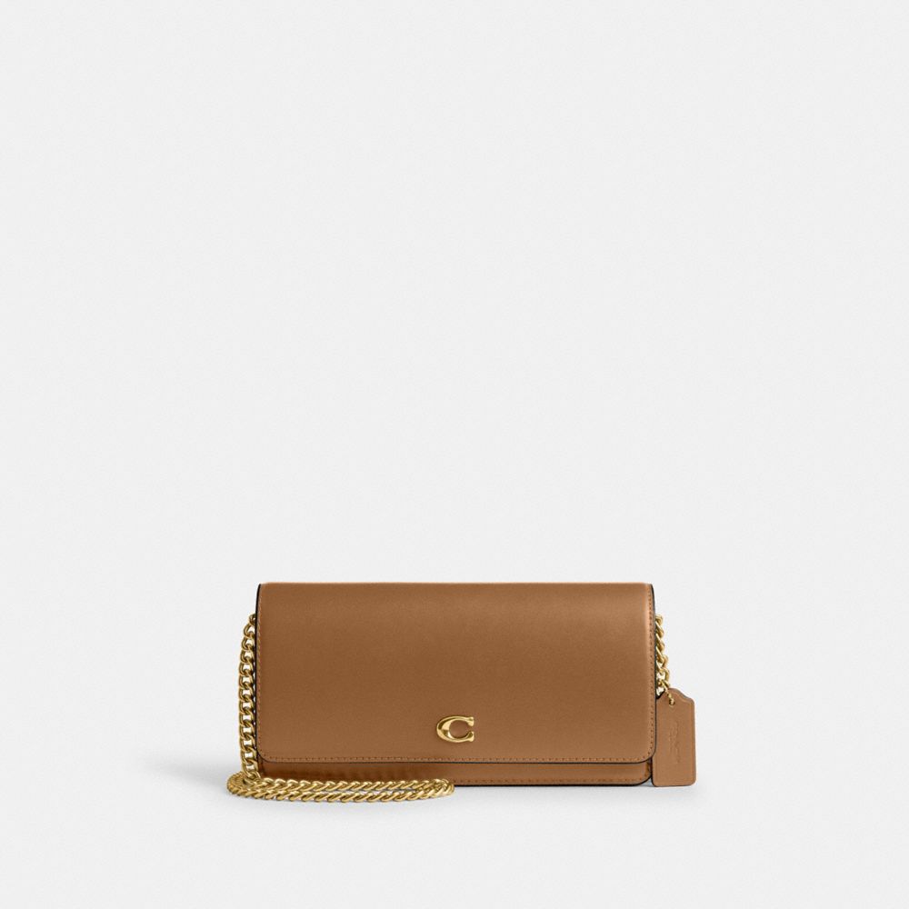 Shop Coach Evie Langes Portemonnaie Mit Kettenriemen In Brass/honey Brown