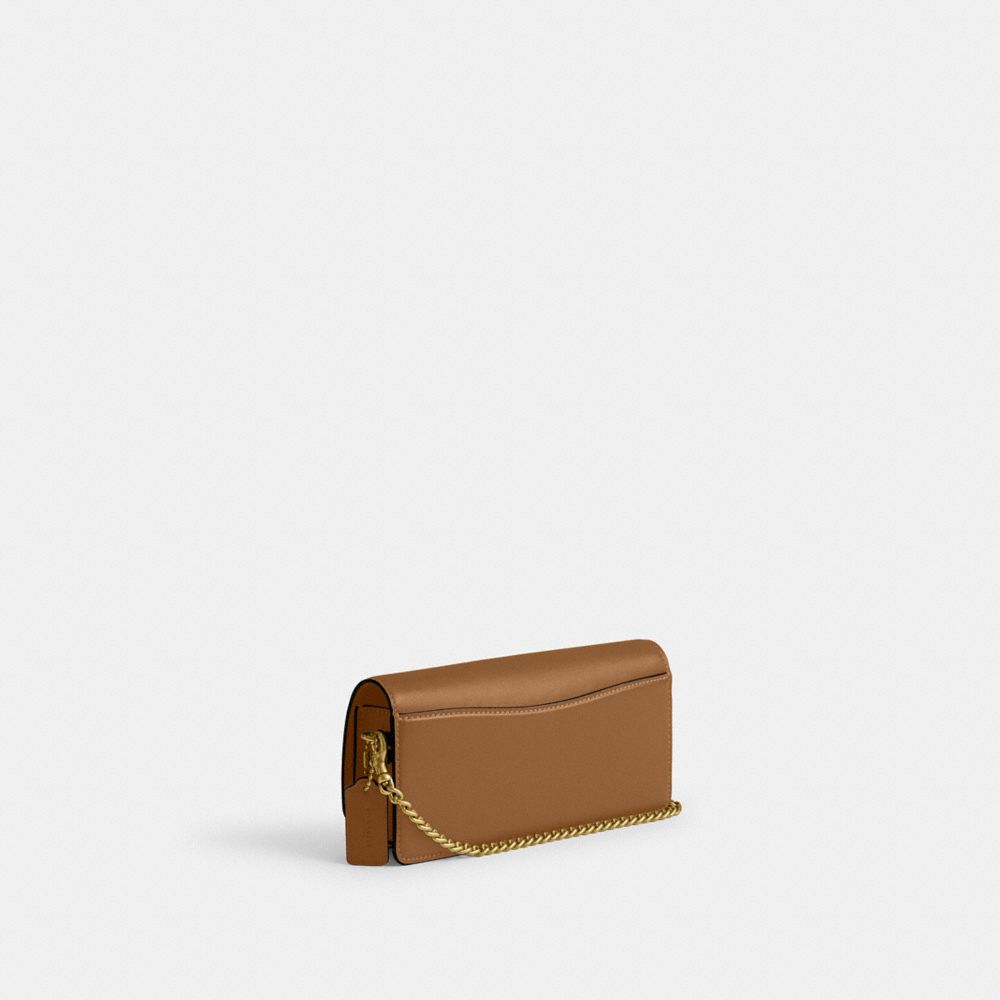 Shop Coach Evie Langes Portemonnaie Mit Kettenriemen In Brass/honey Brown