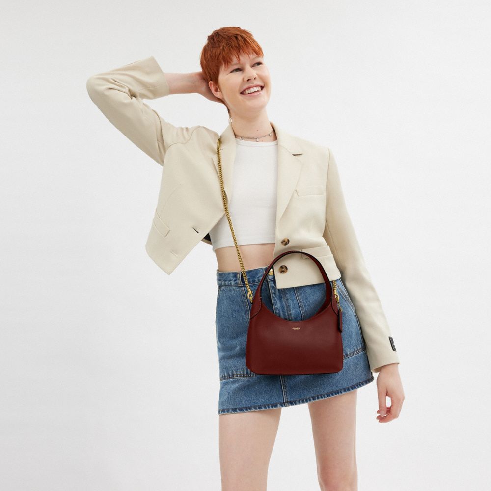 Coach In Brass/dark Ruby