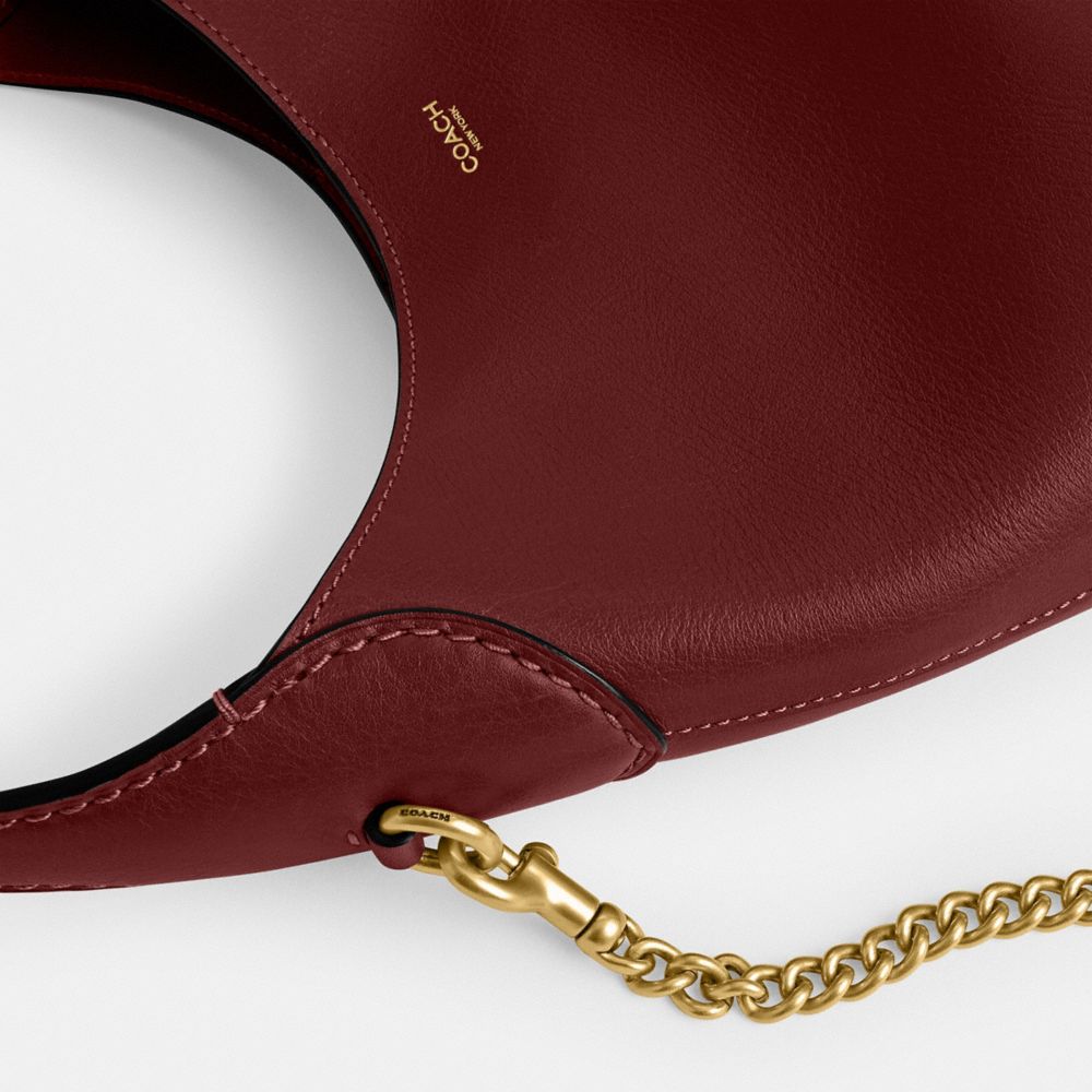 Coach In Brass/dark Ruby