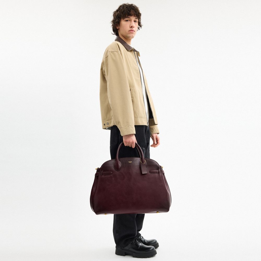 COACH®,Soft Empire Carryall Bag 48,Duffle Bag,Logo,Studded,Expandable,Maroon,Angle View