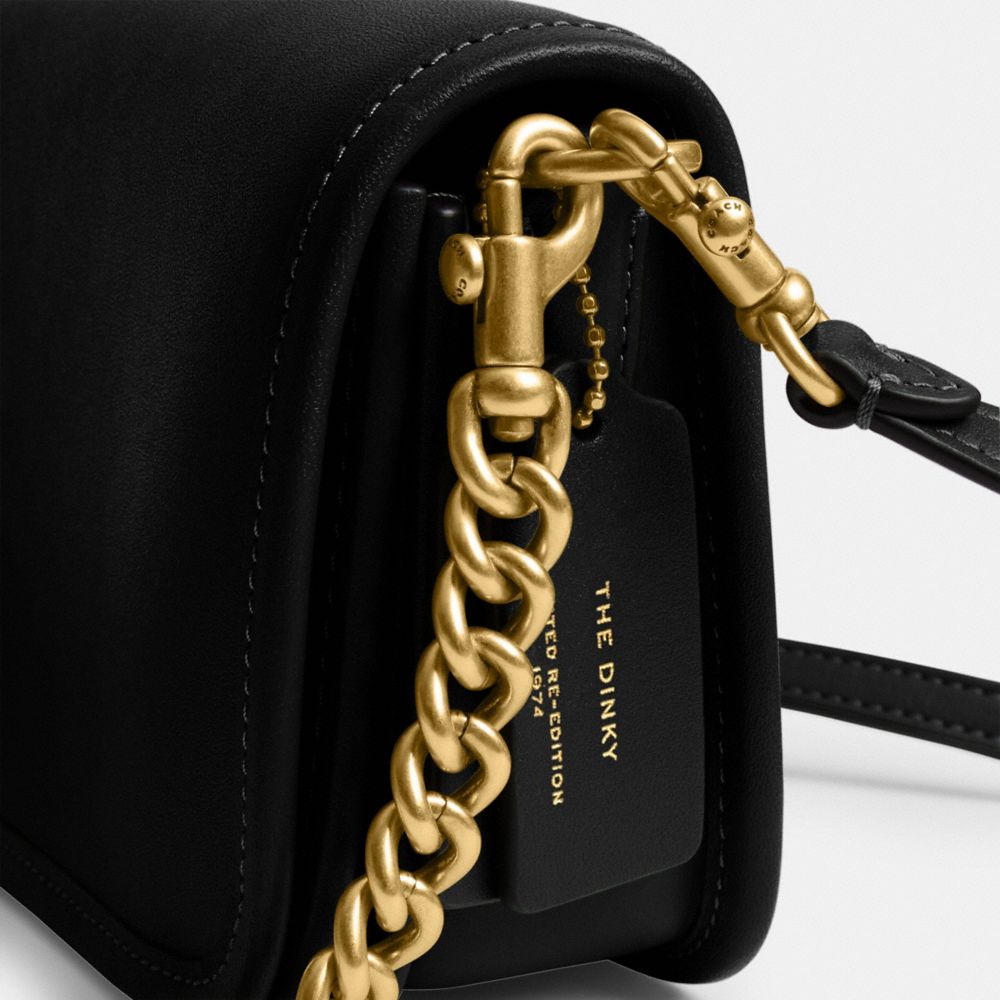 Shop Coach Dinky Tasche In Brass/black