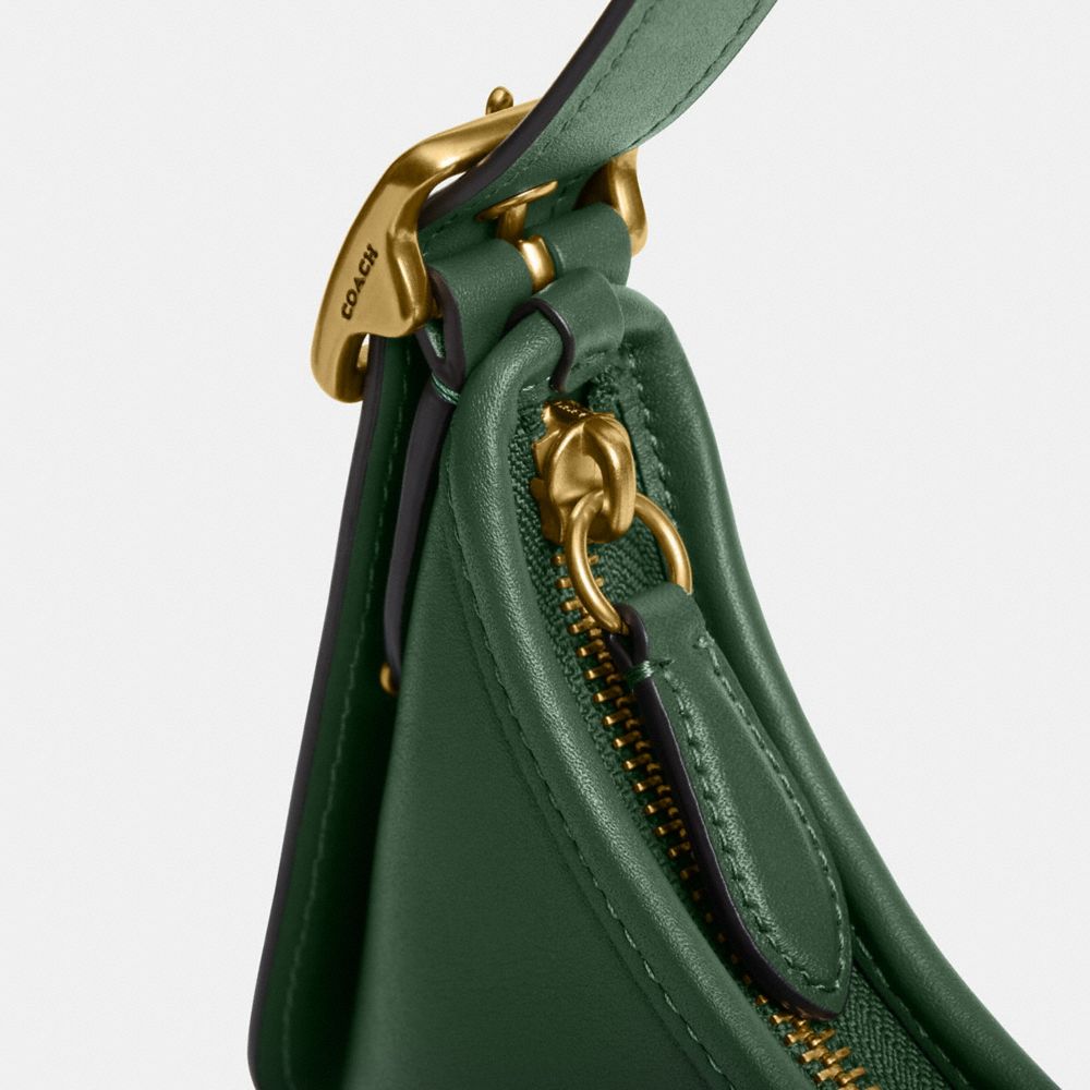 Shop Coach Hamptons Hobo In Brass/hunter Green