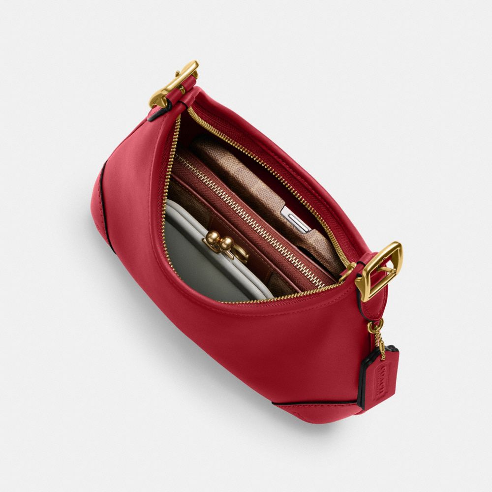 Shop Coach Hamptons Hobo In Brass/ruby