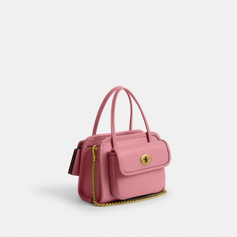 Shop Coach Safari Bag In Brass/true Pink