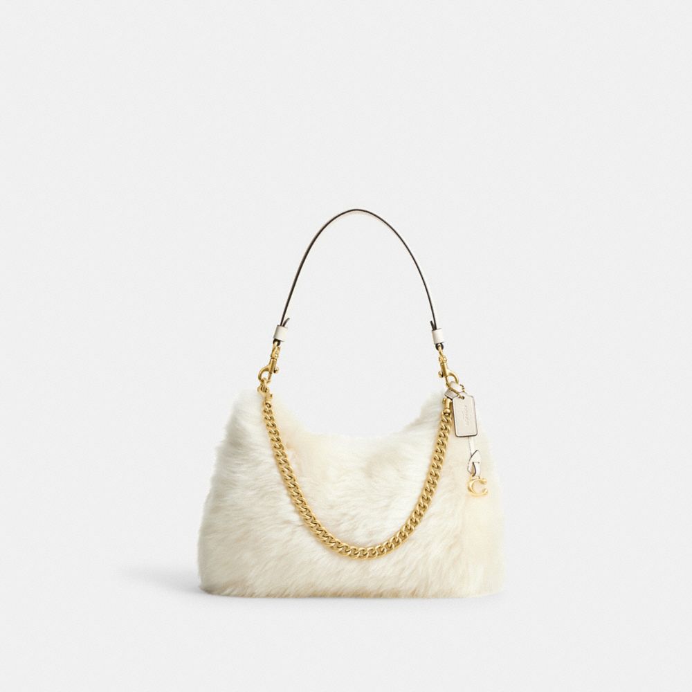 Coach fur purse online