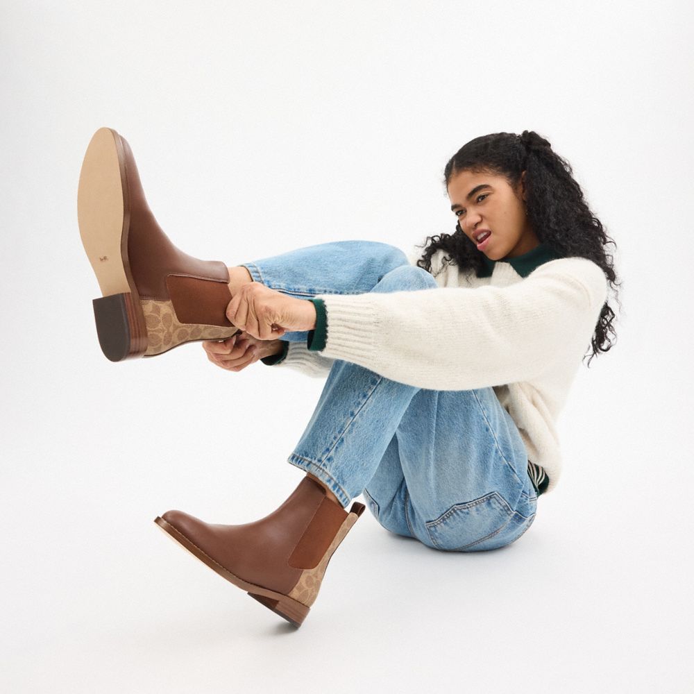 COACH®,Meredith Bootie In Signature Canvas,Rubber,Chelsea Boots,Mixed Media,Sustainable,Pull Tab,Casual,Brown,Detail View