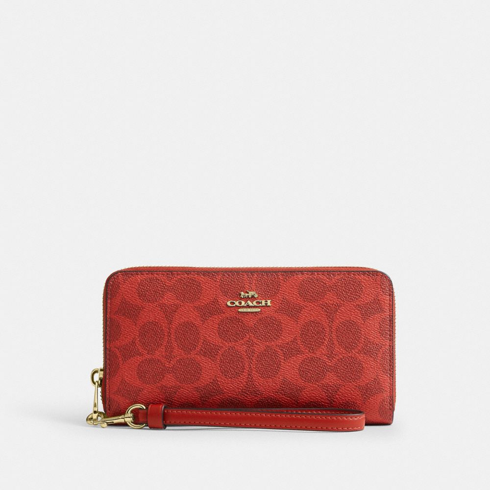 COACH®,LONG PORTEFEUILLE À FERMETURE ÉCLAIR SUR TOUT LE TOUR EN TOILE EXCLUSIVE,Toile exclusive,Or/Cramoisi,Front View